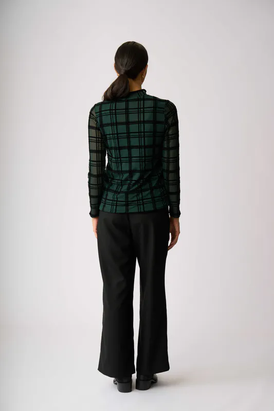 Model wearing Green Check Top - Long Sleeve Polo Neck By Foil Available at Beetees Nelson