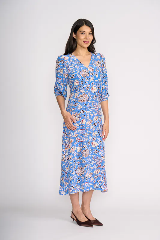 Model wearing Glacial Sketch Cuff & Flow Dress By Foil Available at Beetees Nelson