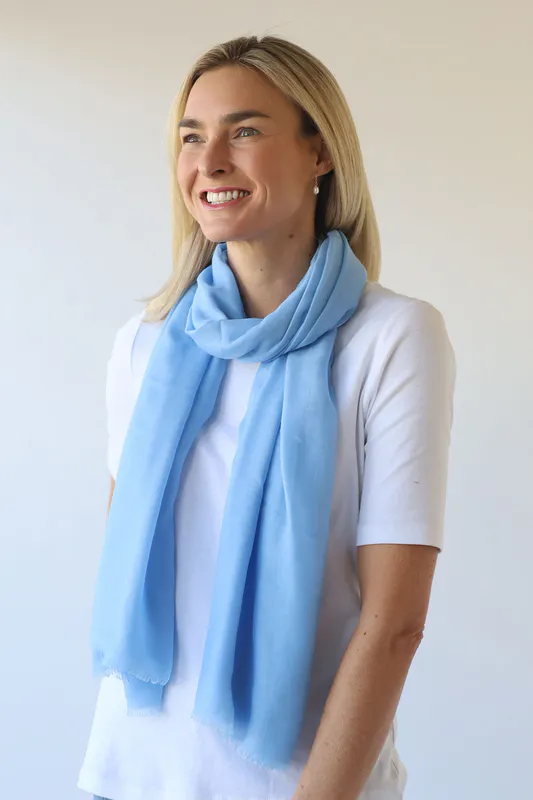 Model wearing Baby Blue Vibrant Plain Scarf By Archer House Available at Beetees Nelson