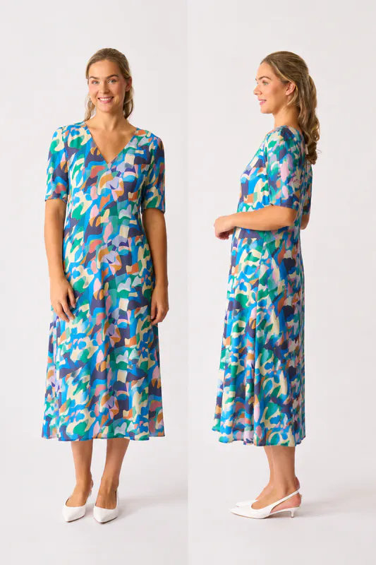 Model wearing Fantasy Encore Chic Dress By Foil Available at Beetees Nelson