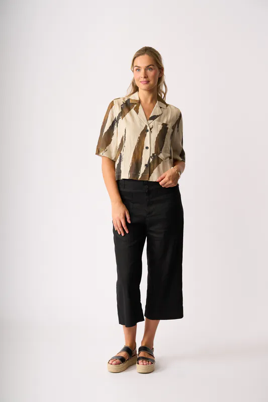 Model wearing Black Trousers - Wide Leg, Mid Length By Oh Three Available at Beetees Nelson