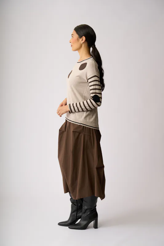 Model wearing Latte Cocoa Black Spots & Stripes Jumper By OH Three Available at Beetees Nelson