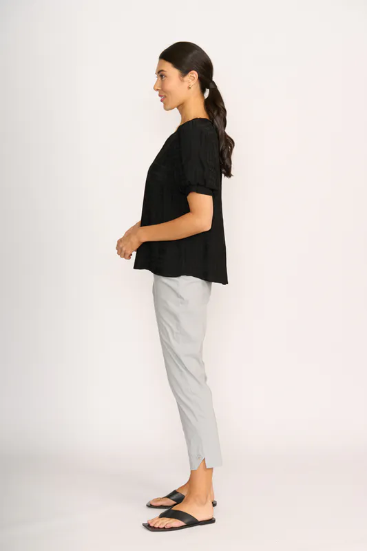 Model wearing Black Top - Volume Sleeve, Scoop Hem By OH Three Available at Beetees Nelson