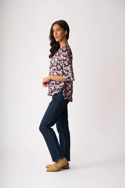 Model wearing Floral Smudge Gathered Scoop Hem Top By Foil Available at Beetees Nelson