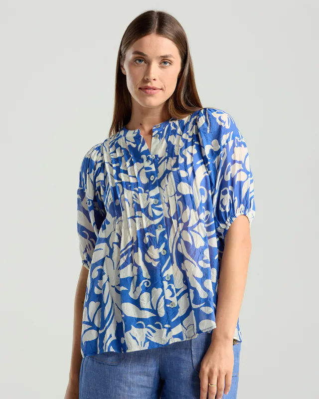 Model wearing Blue Ivory Floral Bridget Pintuck Top By Blackstone Available at Beetees Nelson