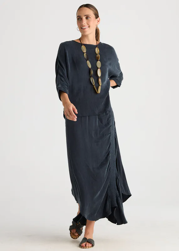 Model wearing Dusk Evening Flow By LD + CO Available at Beetees Nelson