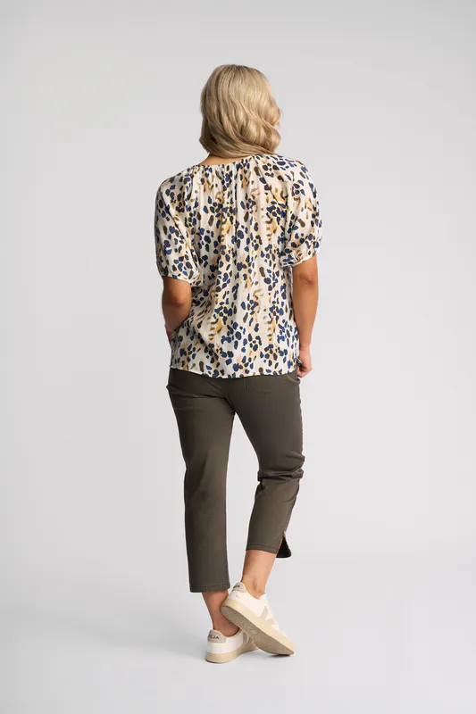 Model wearing Aurora Pitch Top By Vassalli Available at Beetees Nelson