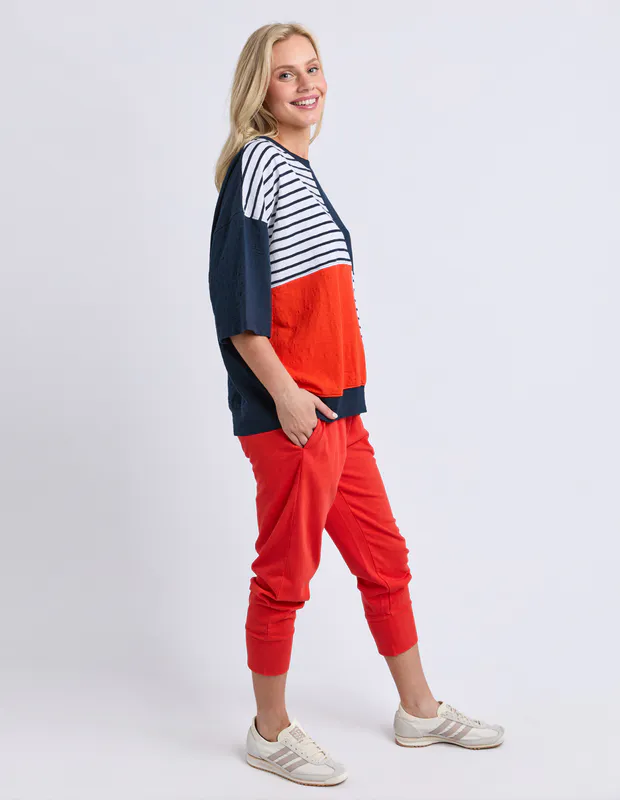 Model wearing Navy/Tangello Fig Sweat By Elm Available at Beetees Nelson