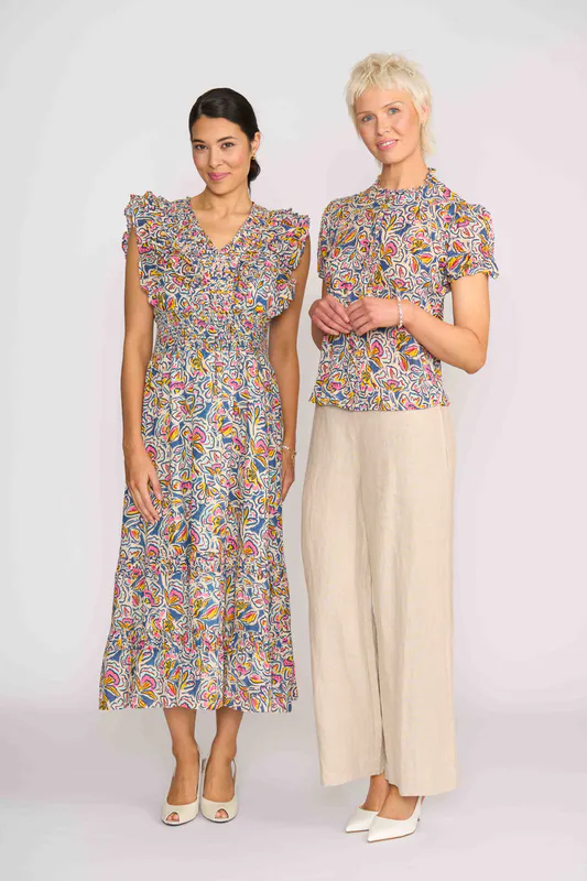 Model wearing Denim Floral Best Odds Dress By Foil Available at Beetees Nelson