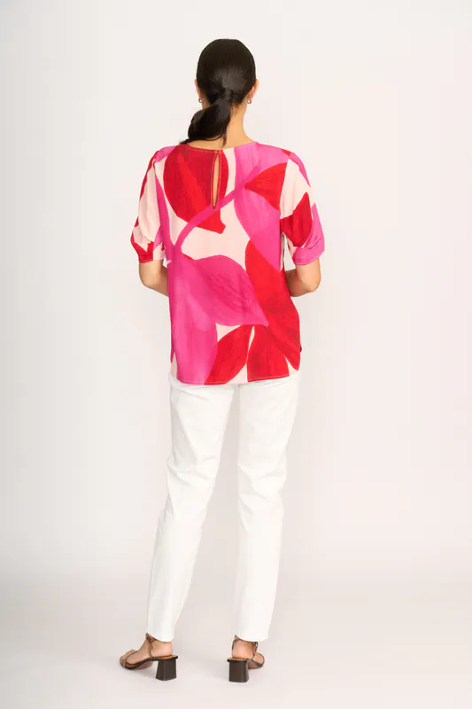 Model wearing Petals Podium Top By Foil Available at Beetees Nelson
