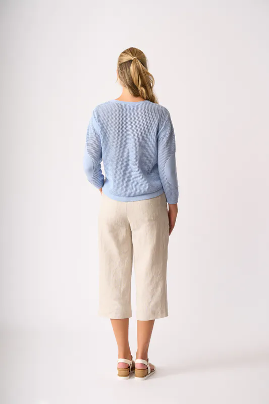 Model wearing Sky Blue Spotted Sweater By Foil Available at Beetees Nelson