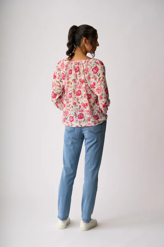 Model wearing Feminine Floral Drawcord Hem Blouse By Memo Available at Beetees Nelson