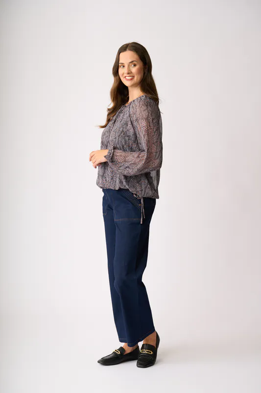 Model wearing Shadow Leopard Drawcord Hem Blouse By Memo Available at Beetees Nelson