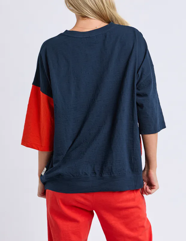 Model wearing Navy/Tangello Fig Sweat By Elm Available at Beetees Nelson