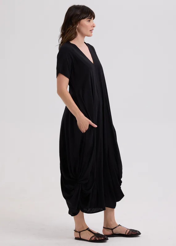 Model wearing Black Drape Bottom Dress By LD + CO Available at Beetees Nelson