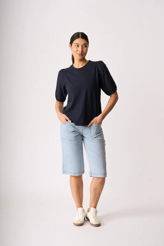 Model wearing True Navy Broderie Sleeve Top By Memo Available at Beetees Nelson