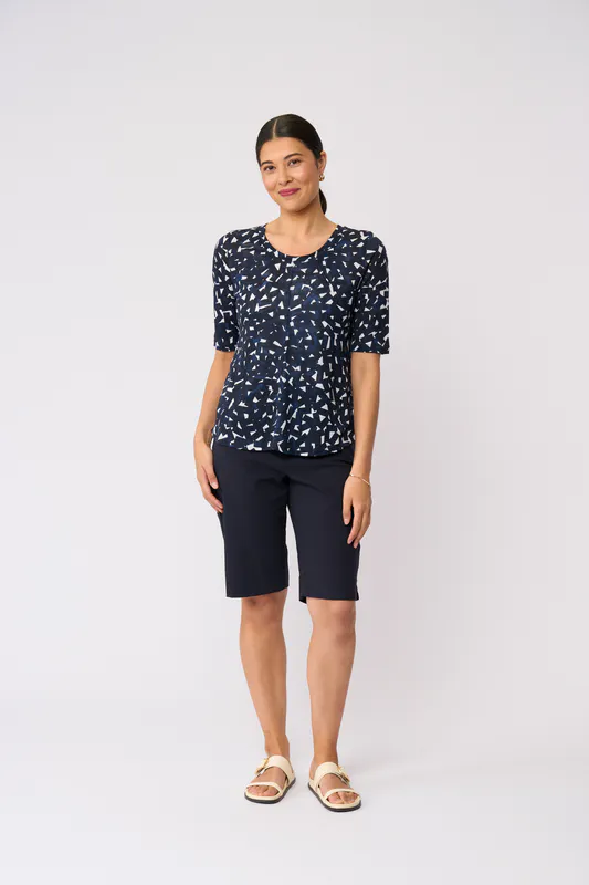 Model wearing Art Style Glow On Top By Foil Available at Beetees Nelson