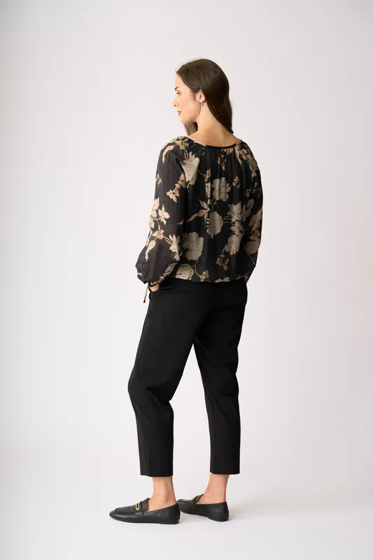 Model wearing Classic Bloom Drawcord Hem Blouse By Memo Available at Beetees Nelson