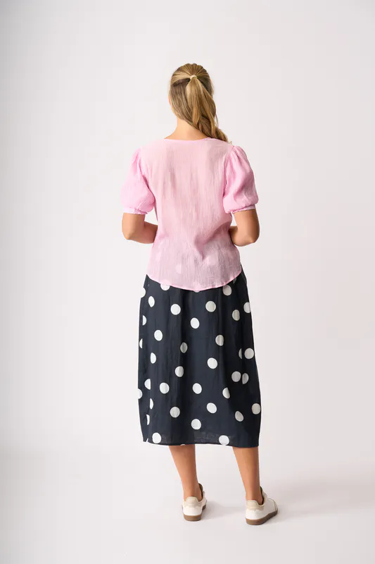 Model wearing Candy Top - Volume Sleeve, Scoop Hem By OH Three Available at Beetees Nelson