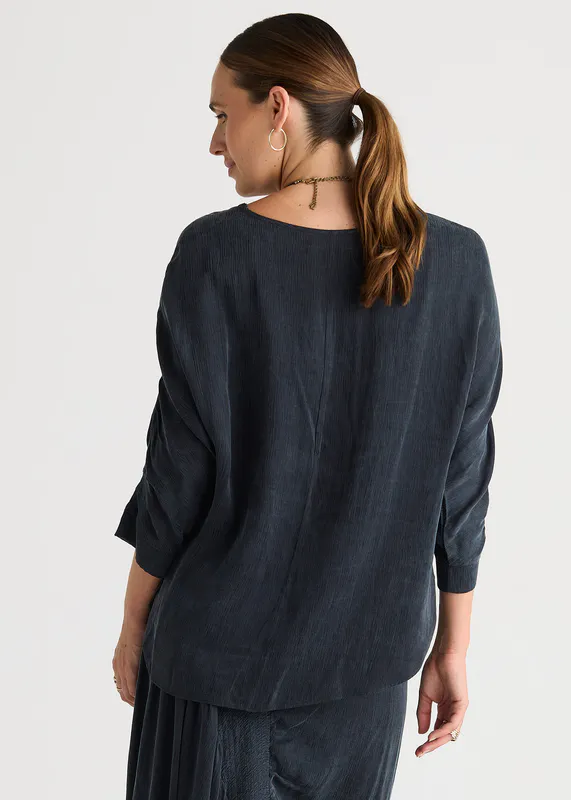 Model wearing Dusk Evening Flow By LD + CO Available at Beetees Nelson