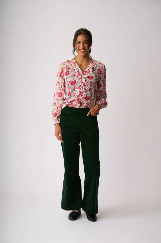 Model wearing Feminine Floral Ruffle & Lace Trim Blouse By Memo Available at Beetees Nelson