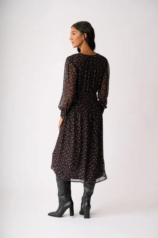 Model wearing Sky Coco Spot Shirr Around Dress By Memo Available at Beetees Nelson