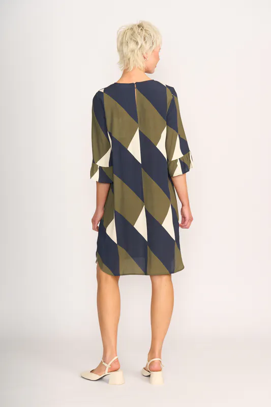 Model wearing Geo Dress - Shift, Fluted Sleeve By Foil Available at Beetees Nelson