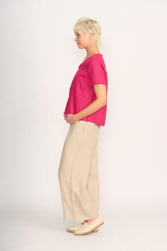 Model wearing Pink V Benefits Top By Foil Available at Beetees Nelson