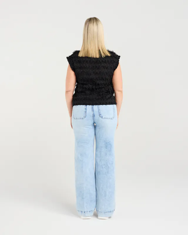 Model wearing Black Tassel Charlotte Top By Zafina Available at Beetees Nelson