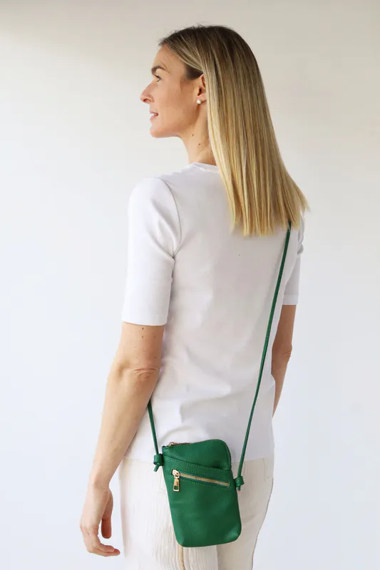Model wearing Emerald Green Long Cross Body Shoulder Strap Bag By Archer House Available at Beetees Nelson