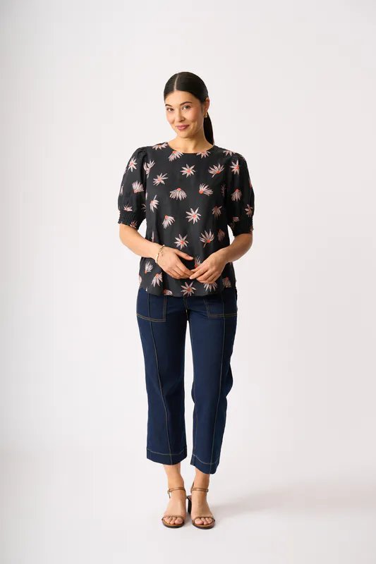 Model wearing In Flower Swing Out Top By Preen Available at Beetees Nelson