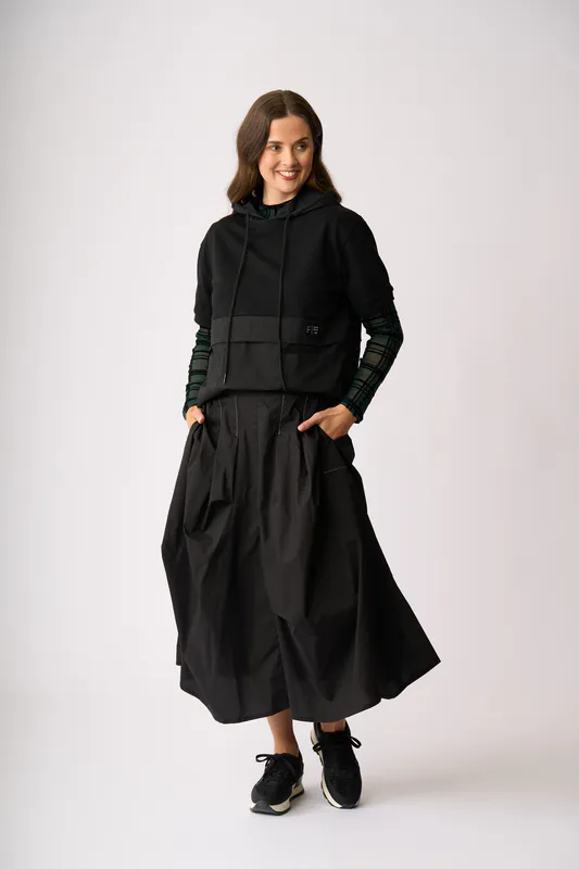 Model wearing Black Contrast Hoodie By Foil Available at Beetees Nelson