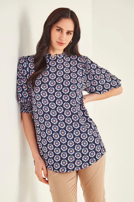 Model wearing Navy Print Susana Top By Lemon Tree Design Available at Beetees Nelson