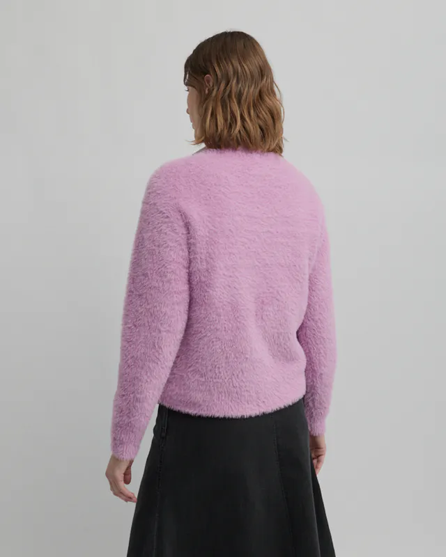 Model wearing Crepe Pink Hearth Knit By Yarra Trail Available at Beetees Nelson