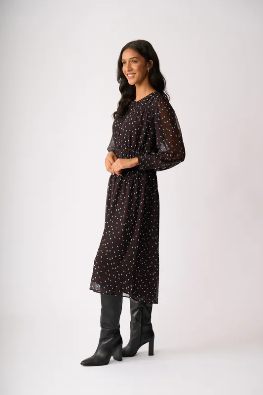 Model wearing Sky Coco Spot Shirr Around Dress By Memo Available at Beetees Nelson