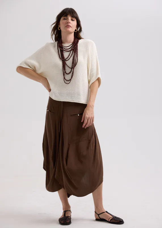 Model wearing Cocoa Drape Bottom Skirt By LD + CO Available at Beetees Nelson