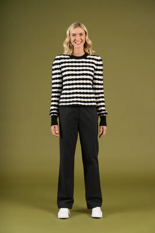 Model wearing Mono Stripe Grassmere Knit By Charlie Jane Available at Beetees Nelson