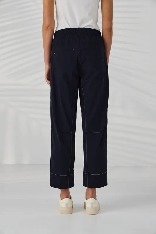 Model wearing Navy Trader Pant By Lania Available at Beetees Nelson