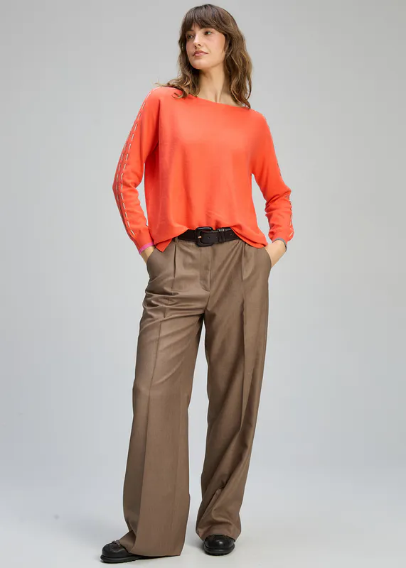 Model wearing Melon Threaded Sleeve Jumper By Zaket & Plover Available at Beetees Nelson