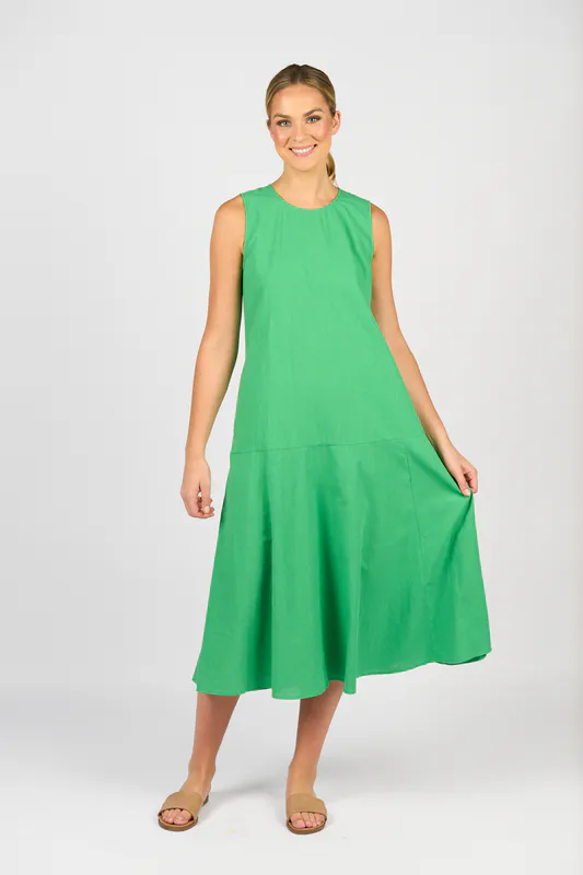 Model wearing Clover Plain Long Sleeveless Dress with Round Neck and Pockets By Vassalli Available at Beetees Nelson