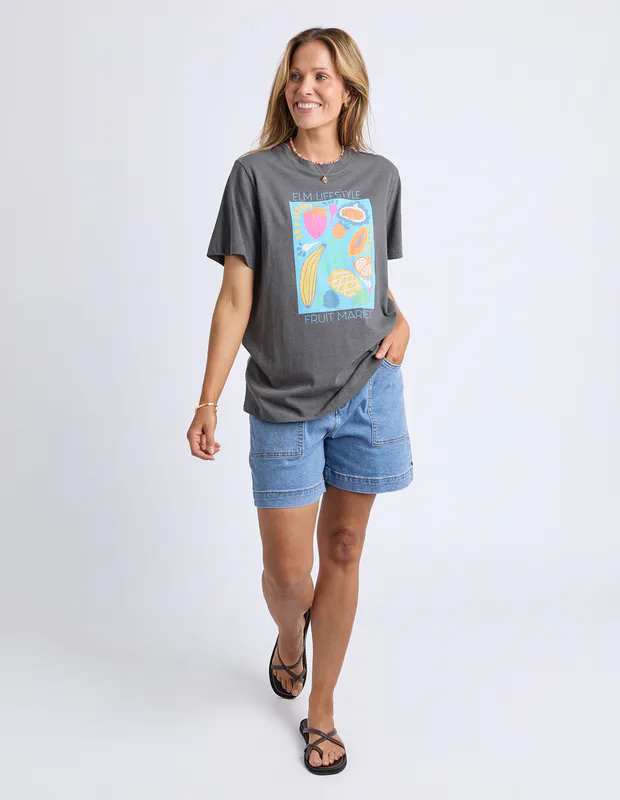 Model wearing Charcoal Fruit Market Tee By Elm Available at Beetees Nelson