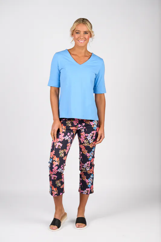 Model wearing Sky V Neck Top By Vassalli Available at Beetees Nelson