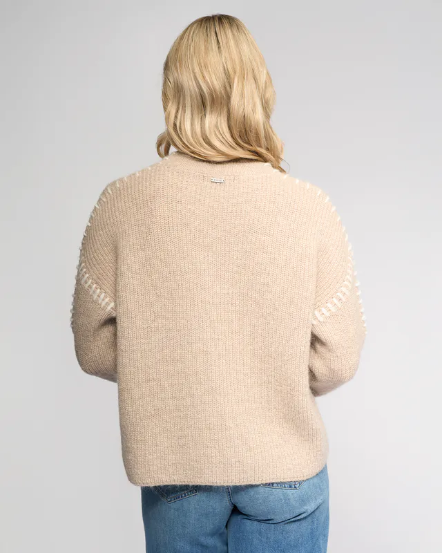 Model wearing Oat/Winter White Lennox Sweater By Knewe Available at Beetees Nelson