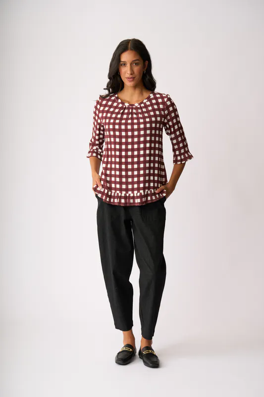 Model wearing Cocoa Check Gathered Scoop Hem Top By Foil Available at Beetees Nelson