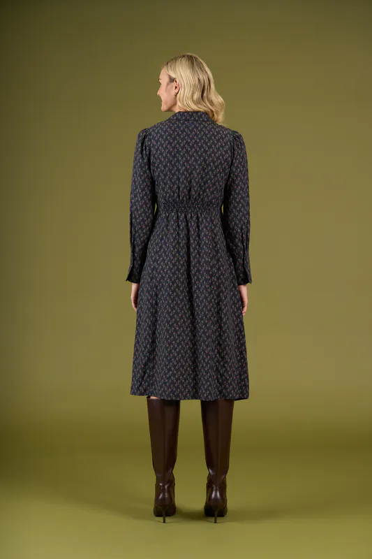 Model wearing Black/Khaki Britomart Dress By Charlie Jane Available at Beetees Nelson