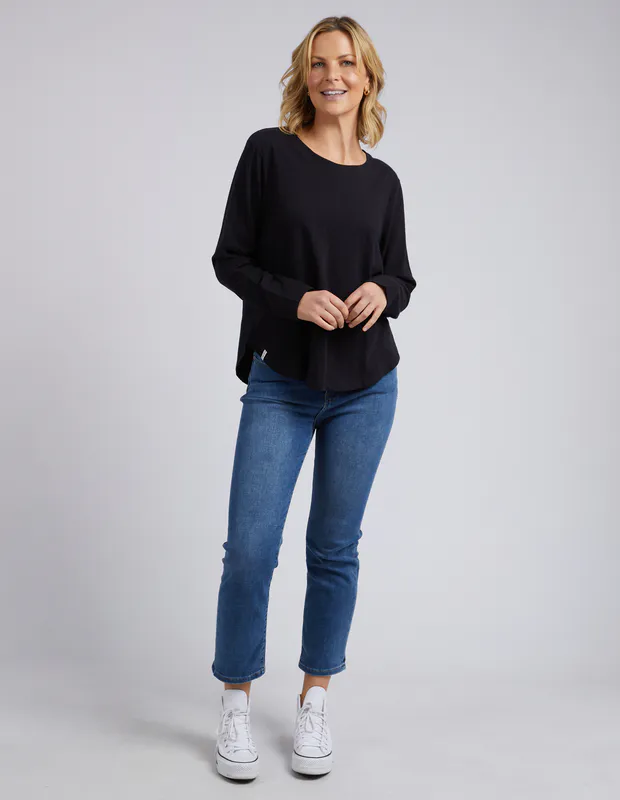 Model wearing Black Everyday Long Sleeve By Elm Available at Beetees Nelson