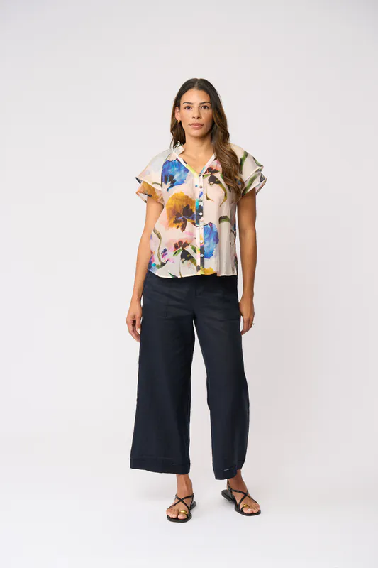 Model wearing True Navy Top Rank Trousers By Foil Available at Beetees Nelson