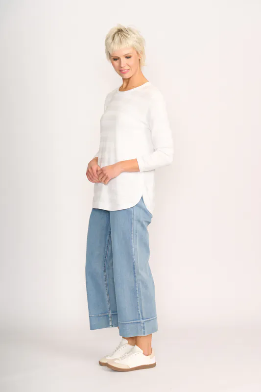 Model wearing White Jumper - Stripe Scoop By Foil Available at Beetees Nelson