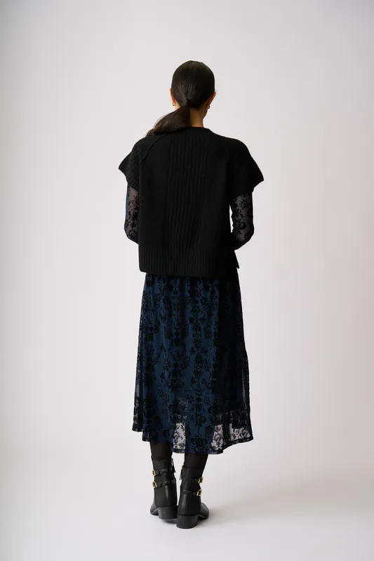 Model wearing Black Let It Rib Popover By Oh Three Available at Beetees Nelson