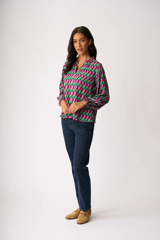 Model wearing Art Deco Elasticated Cuff Blouse By Foil Available at Beetees Nelson